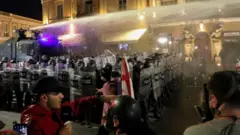Escalating Tensions in Tbilisi: Protesters Clash with Police at Presidential Palace