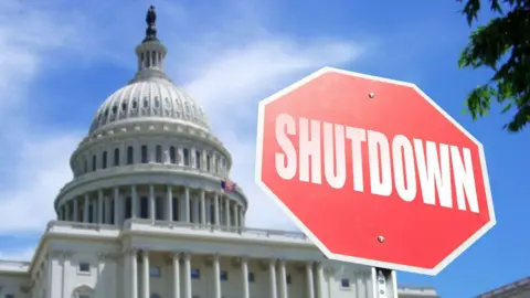 Federal Workers Grapple with Pay Uncertainty Amid US Government Shutdown