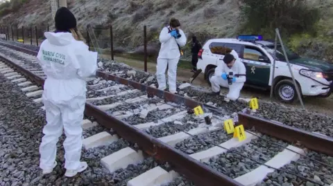 Fractured Track Cited as Cause in Spain's Train Disaster