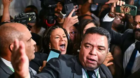 Disorderly Showdown in Brazil's Congress: Lawmakers Clash Over Bolsonaro's Sentence Reduction