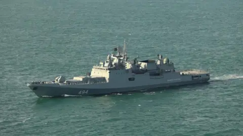 Russian warship fires warning shots at UK‑registered yacht in English Channel