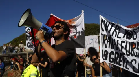 Nationwide Strikes Erupt in France Against Budget Cuts