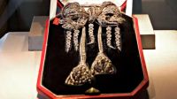 A daring robbery at the Louvre Museum raises alarming questions about the security of France's cultural treasures as thieves steal valuable items including crowns, necklaces, and brooches.