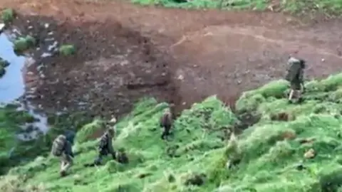 Tragic End to New Zealand Bushman Manhunt: Father Killed in Police Shootout