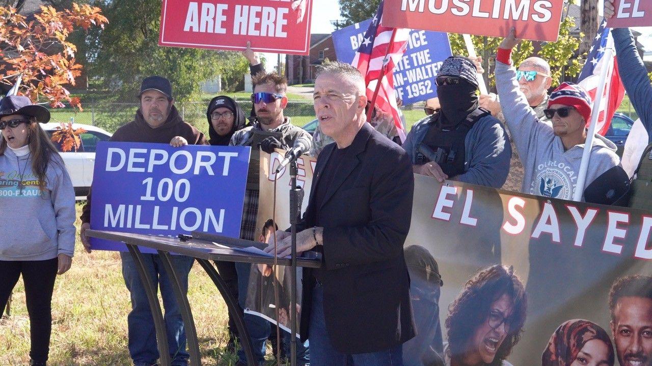 Greg Bovino speaking at a rally