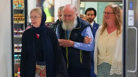 British Couple Detained by Taliban Lands Back in the UK After Eight-Month Ordeal