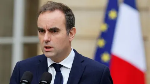 French Political Crisis Deepens as Outgoing PM Seeks Stability
