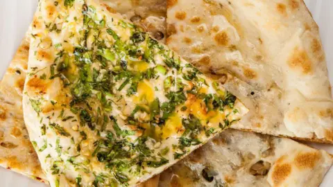 From Royal Dining to Global Delight: The Journey of Naan Bread
