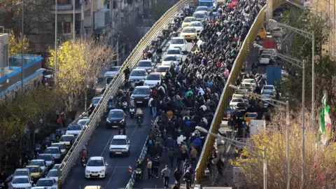 Waves of Protest Erupt in Iran Amidst Currency Crisis