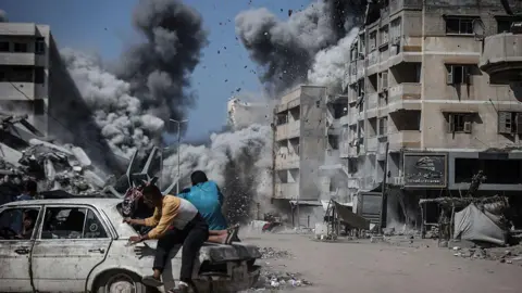 Israeli Air Strikes Claim Lives of Civilians in Gaza Amid Ongoing Conflict