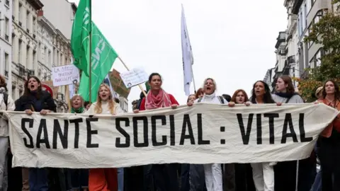 Massive National Strike Disrupts Belgium: Protesters Rally Against Government Reforms