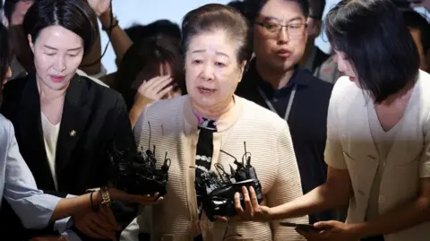 Unification Church Leader Denies Bribery Allegations in South Korean Scandal