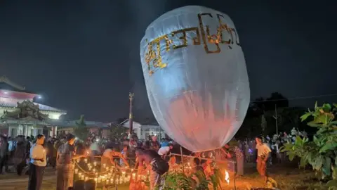 Tragedy Strikes Myanmar Buddhist Festival: Paraglider Bombing Claims 24 Lives