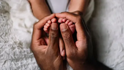Historic Ruling by South Africa's Top Court Grants Equal Parental Leave to Fathers