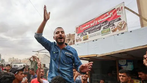Palestinians Respond to Ceasefire Deal with Mixed Emotions of Celebration and Grief