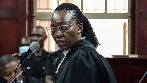 Former Kenyan justice minister blocked from entering Uganda