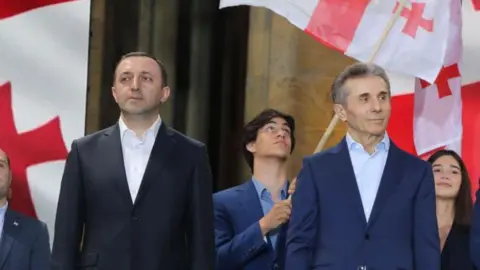 Georgia's Former Prime Minister Faces Serious Corruption Charges Following Major Cash Discovery