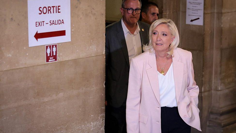 Marine Le Pen arrives to attend verdict in appeal trial