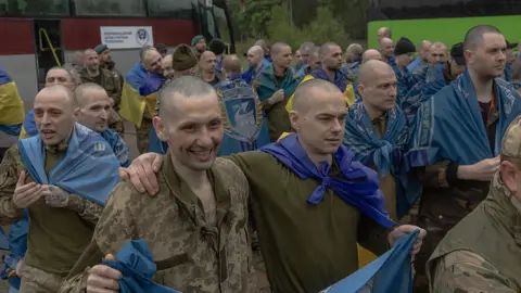 Kyiv Mourns Victims of Russian Strike Amid Prisoner Exchange