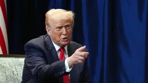 Trump Dismisses Risk of War with Venezuela Amid Ongoing U.S. Strikes