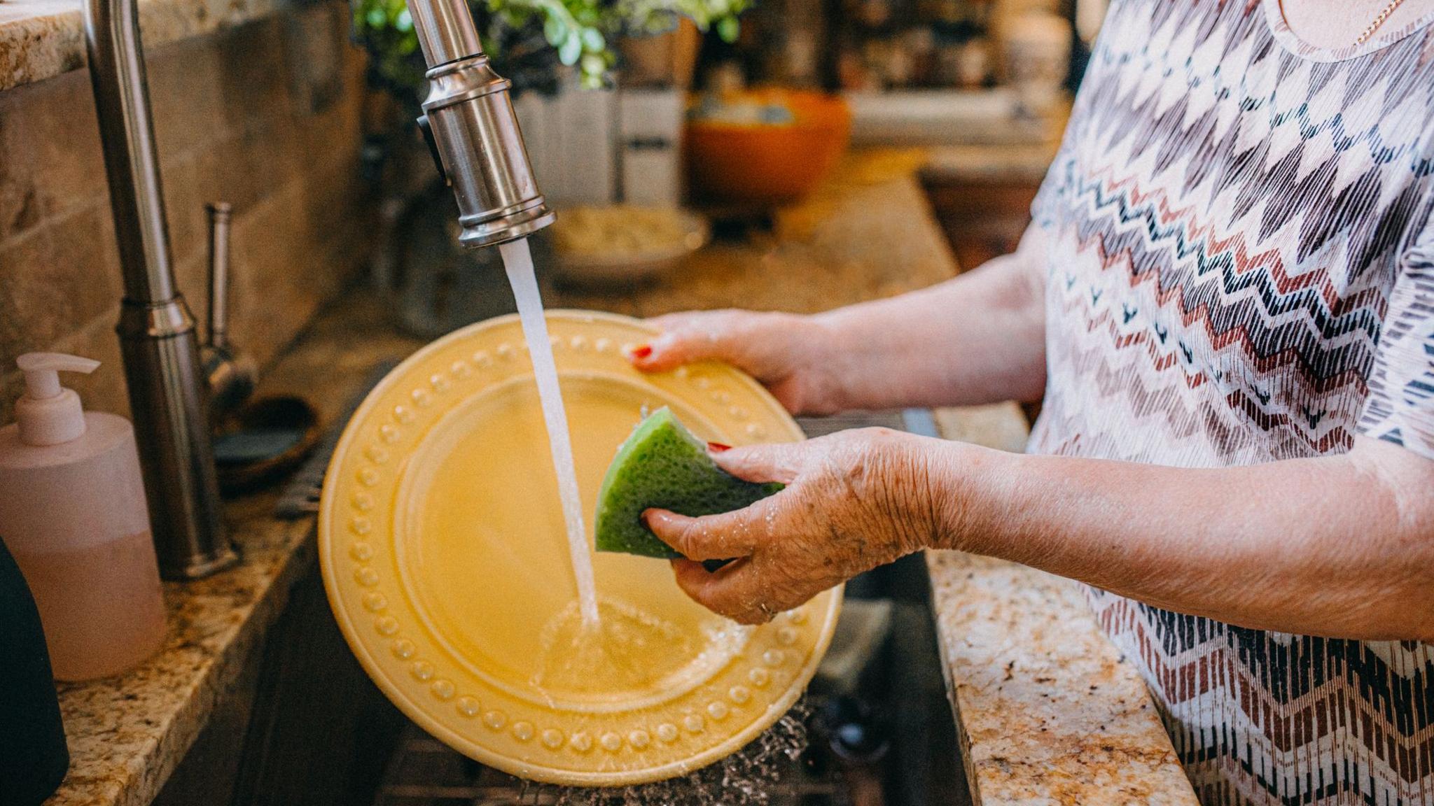 Guest washing dish, illustrating new rule