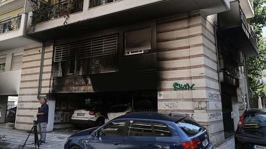 Greek Politician’s Mother Dies After Arson Attacks on New Democracy Homes