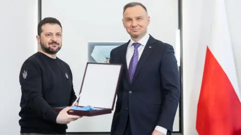 Ukraine’s President Zelensky stripped of Poland’s top honour amid WWII row
