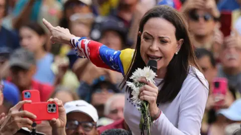 Venezuelan Opposition Leader Risks Fugitive Status Over Nobel Peace Prize