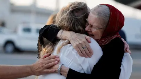 Joyful Reunion: British Couple Released from Taliban Detention Returns to the UK